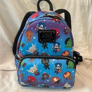 Marvel Avengers Loungefly backpack blue and purple galaxy fade ombré background